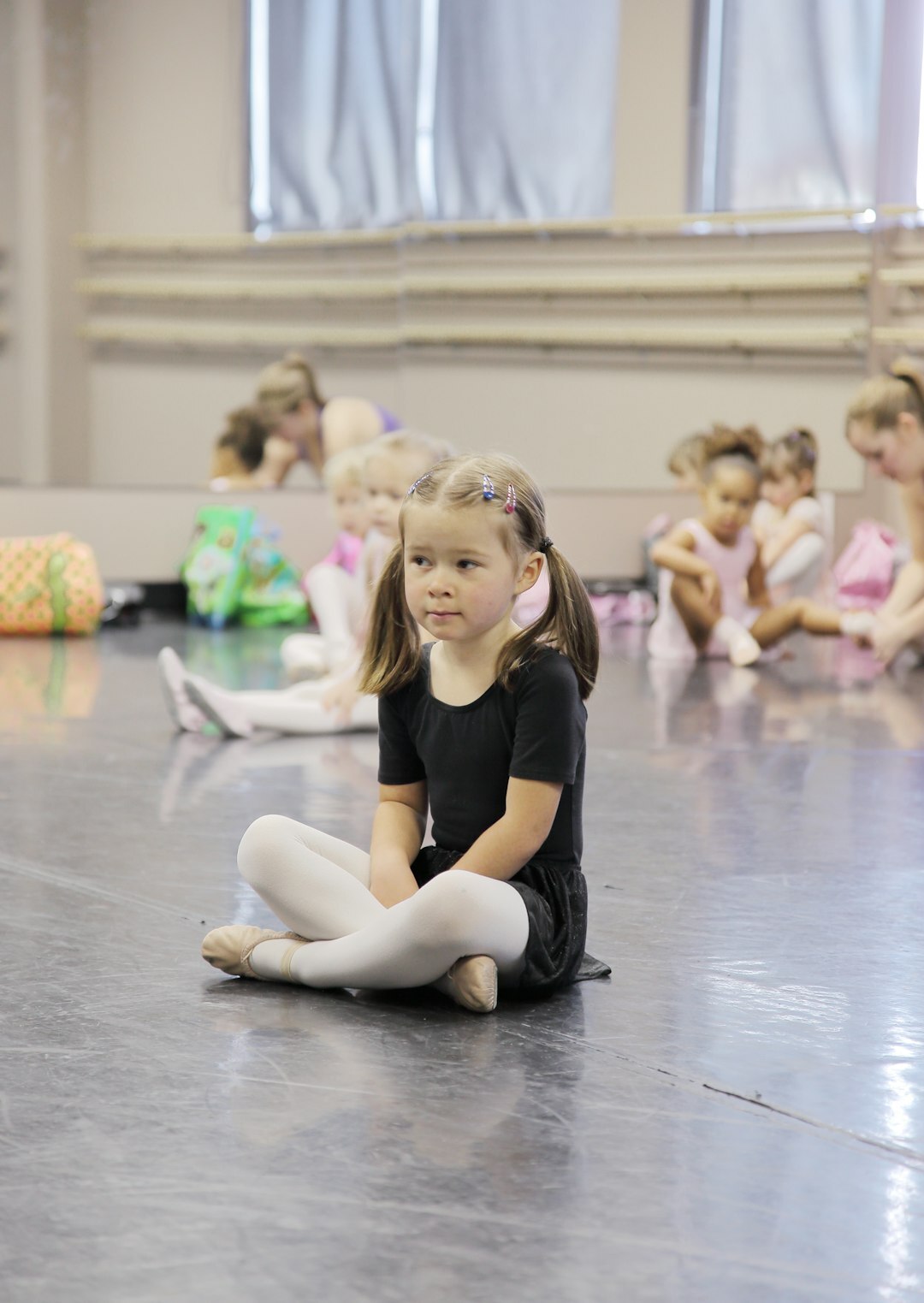 Students rehearsing stage movement and body language on a studio floor