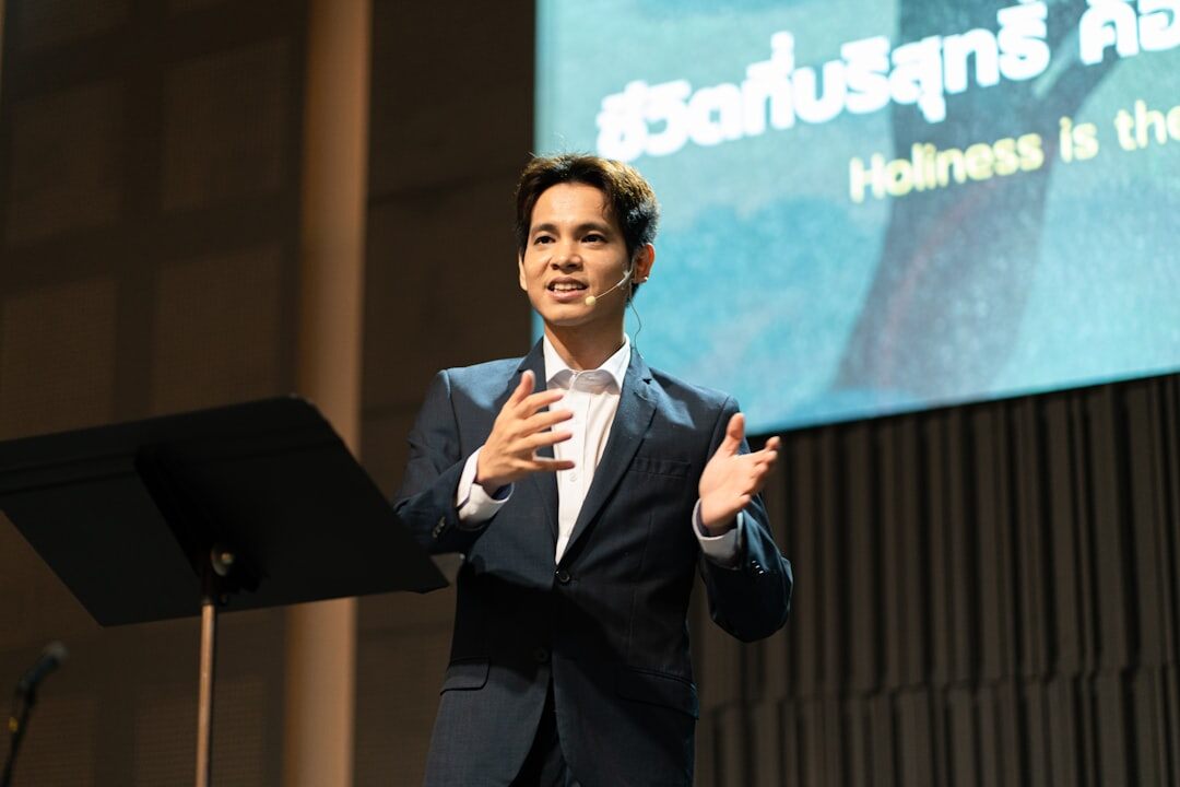 man giving speech at event